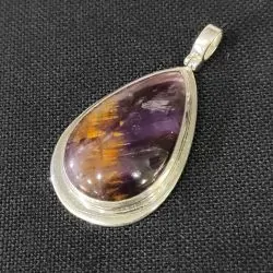 Pendentif Super Seven serti...