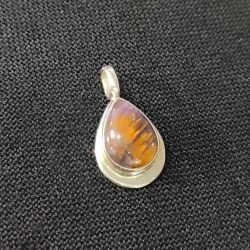 Pendentif Super Seven serti...