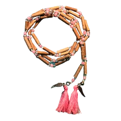 Collier mala en noisetier avec pompons rose fuchsia | Dans les yeux de Gaïa