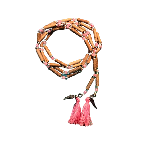 Collier mala en noisetier avec pompons rose fuchsia | Dans les yeux de Gaïa