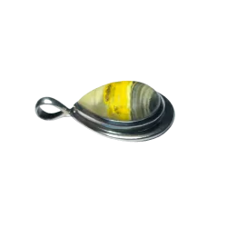 Pendentif en Orpiment serti...