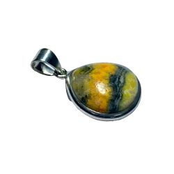 Pendentif en Orpiment serti...